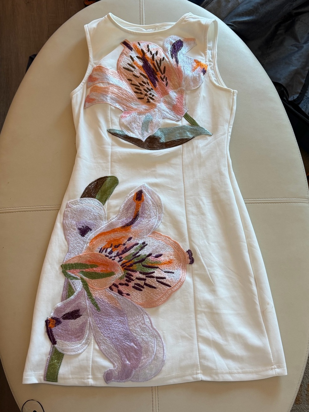 White Sleeveless Dress with Large Floral Appliqués